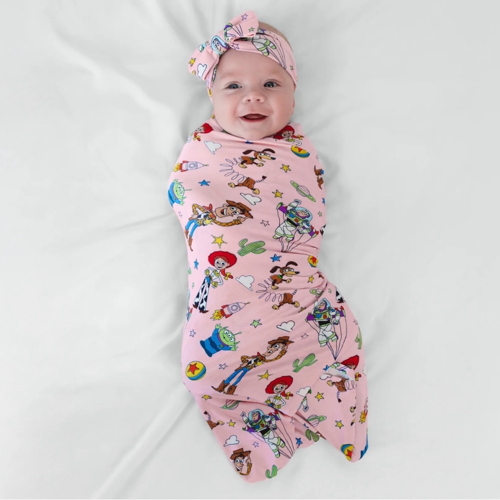 Little sleepies Toy Story pink swaddle with bow